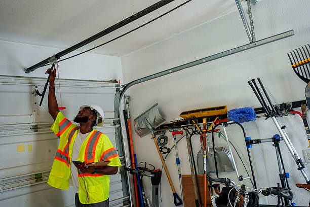 Professional Garage Door Roller Replacement technician working in Everett, MA